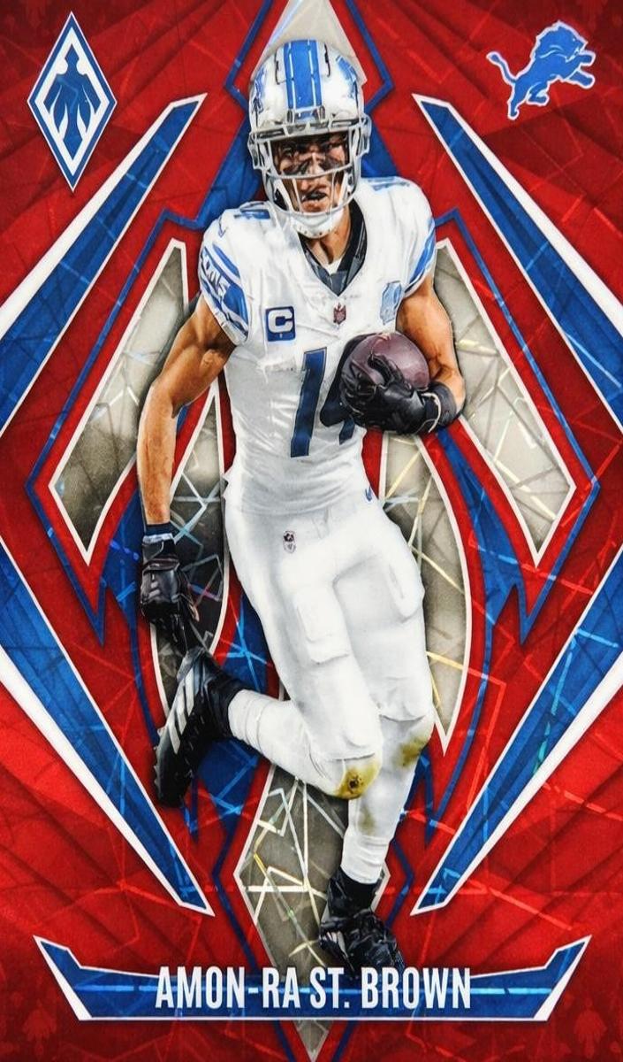 2024 Panini Phoenix Football Red Lazer Amon-Ra St. Brown #8