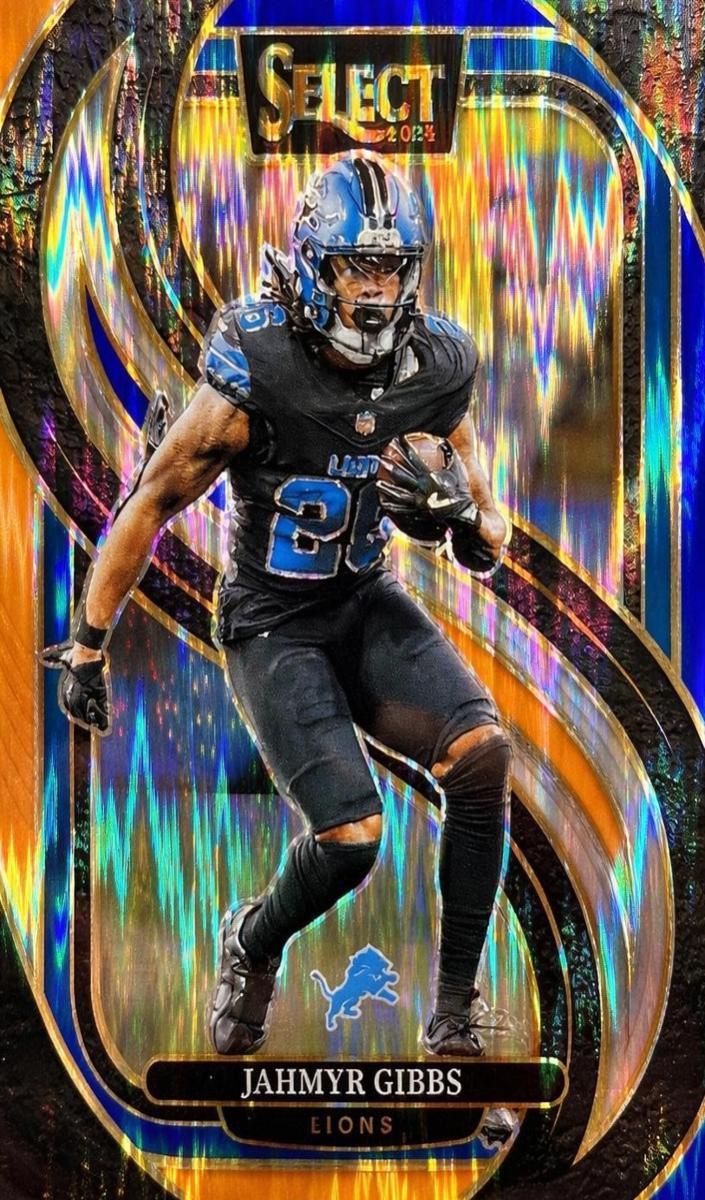 2024 Panini Select Football Blue and Orange Shock Jahmyr Gibbs #163