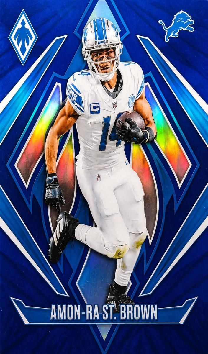 2024 Panini Phoenix Football Blue Amon-Ra St. Brown #8
