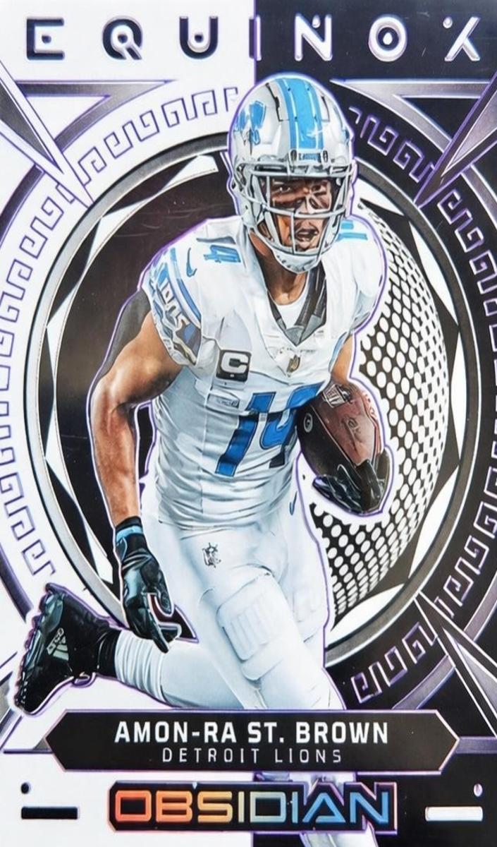 2023 Panini Obsidian Football Electric Etch Purple Amon-Ra St. Brown #9 PSA 9