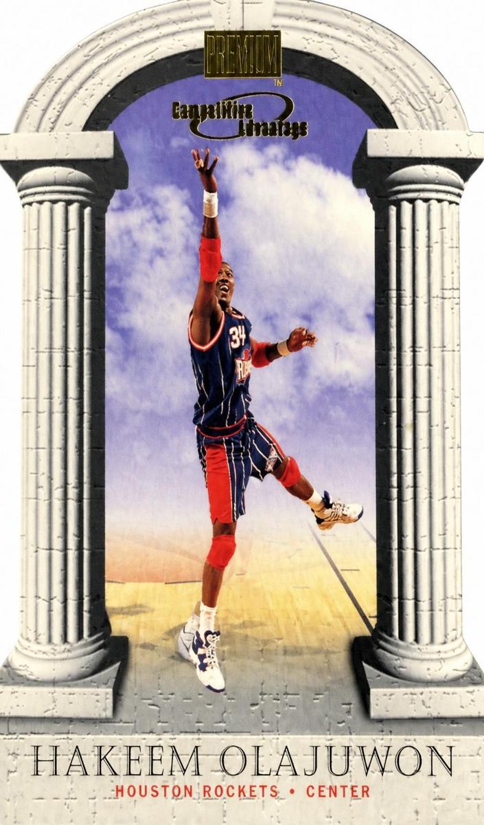 1997 Skybox Premium Basketball Hakeem Olajuwon #14CA