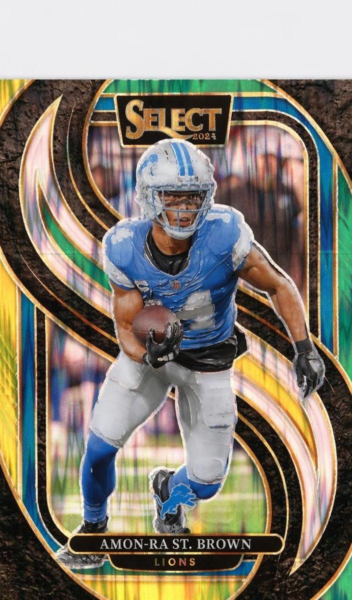 2024 Panini Select Football Green and Yellow Shock Amon-Ra St. Brown #105