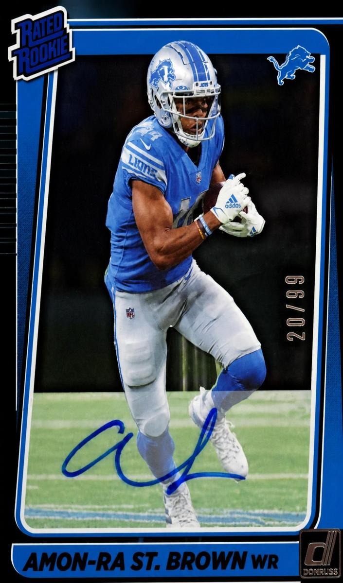 2021 Panini Clearly Donruss Football Blue Amon-Ra St. Brown #84 PSA 8