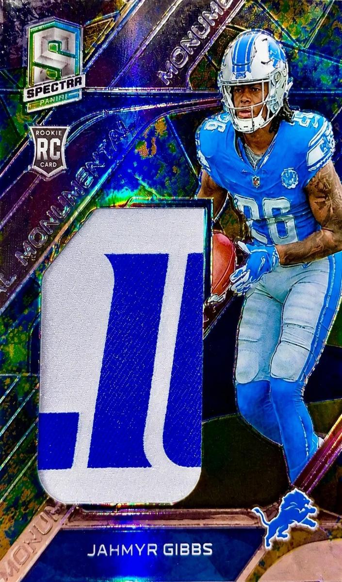 2023 Panini Spectra Football Neon Splatter Jahmyr Gibbs #NE-JGI PSA 7.5
