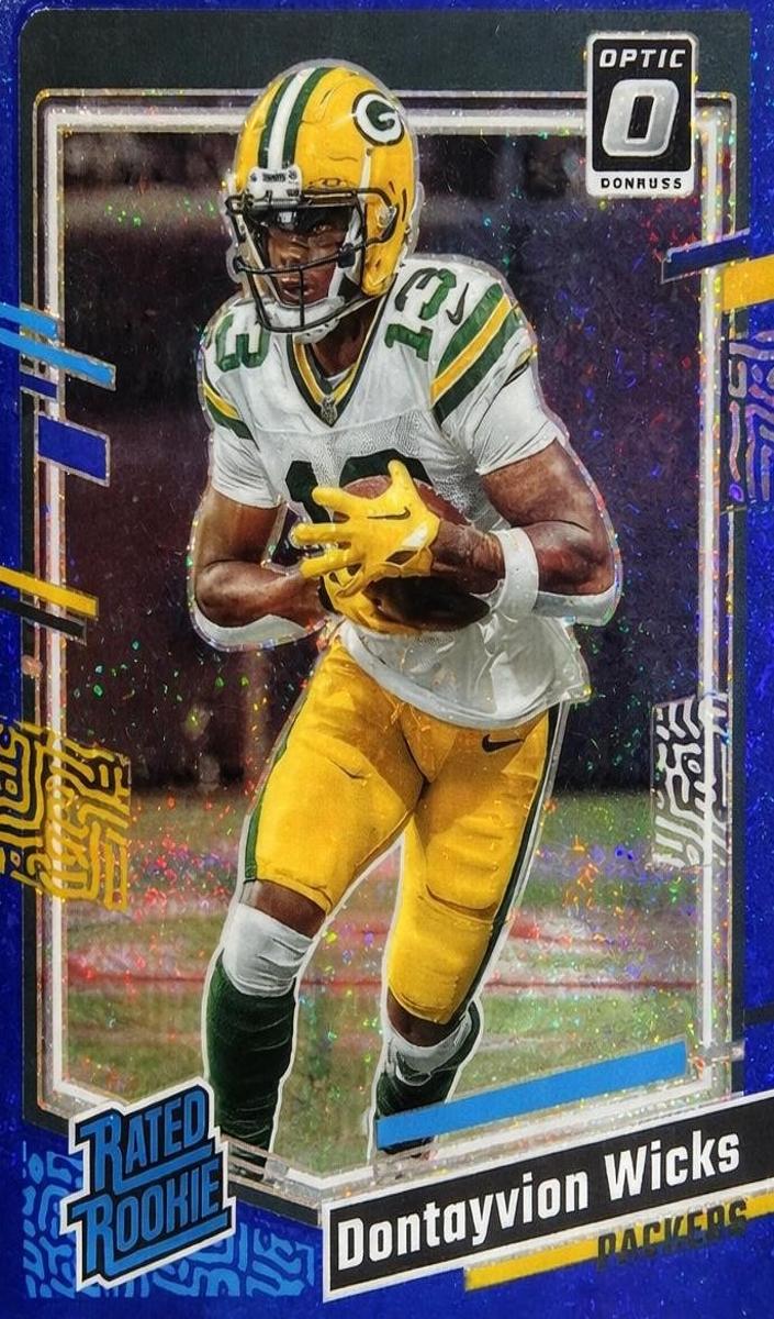 2023 Donruss Optic Football Blue Dontayvion Wicks #249 PSA 8.5