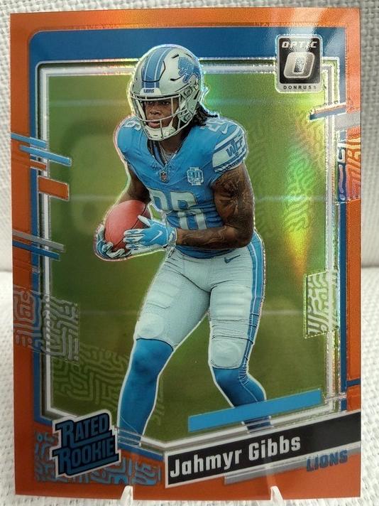 2023 Donruss Optic Football Orange Jahmyr Gibbs #236