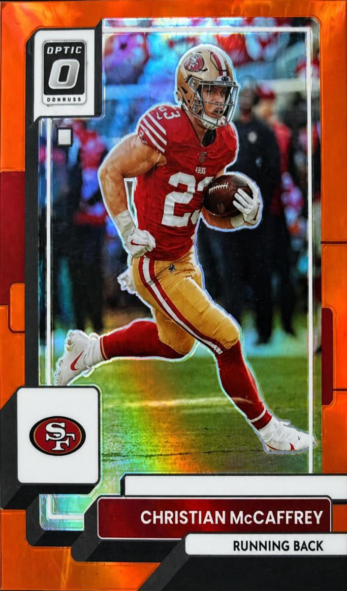 2022 Donruss Optic Football Orange Christian McCaffrey #153 PSA 8.5